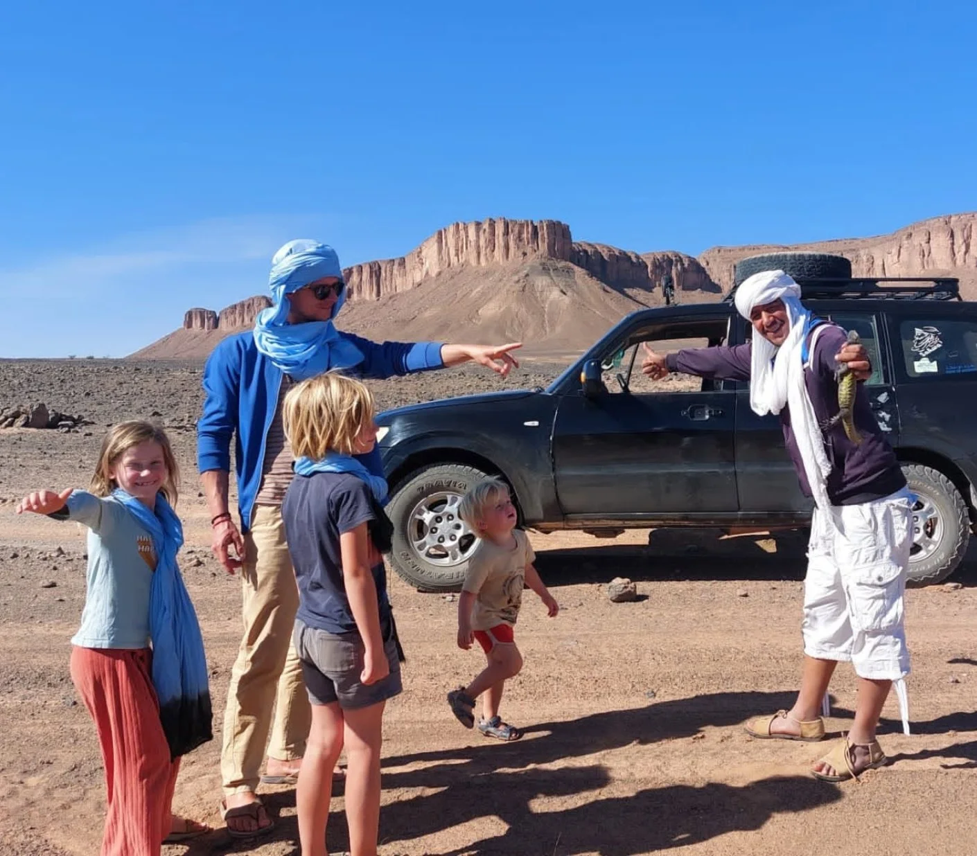 Iriki Desert Tours owner with clients during a Sahara desert experience
