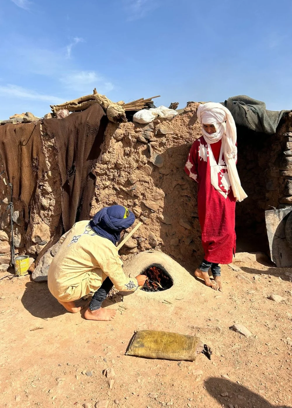 Iriki Desert Tours owner with a local desert guide in Morocco